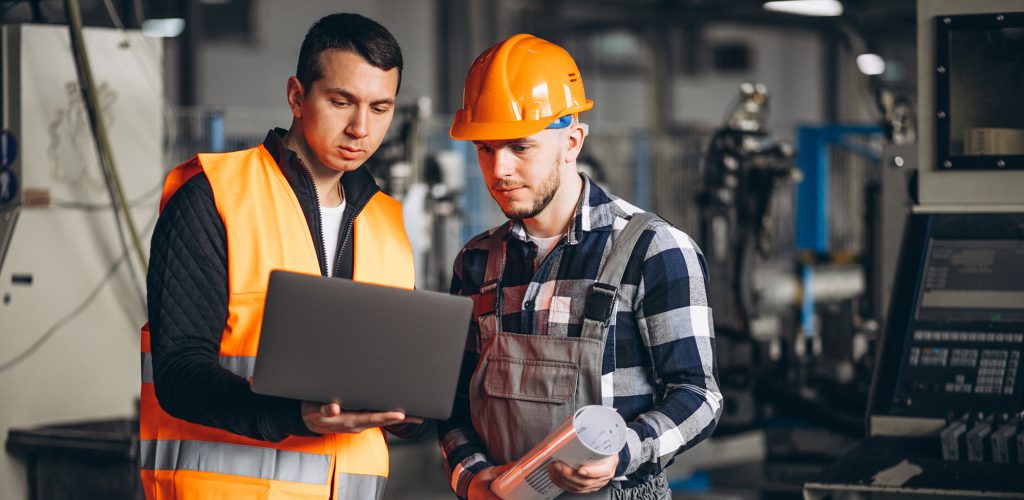 Two colleagues at a factory